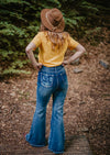 Back view of A super fun and sexy jeans design with a bleached out buffalo and aztec print on the back pockets and lower leg.  These luxury stretch jeans are beautifully adorned with embellishment in southwestern patterns to give you a truly unique core piece for your wardrobe.UK Exclusive Grace in LA Stockist, Get Grace in LA in UK. 